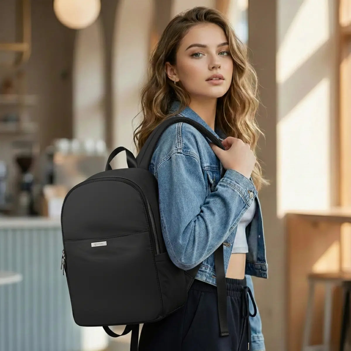 Everyday Essentials minimalist backpack in black with clean silhouette for everyday organization