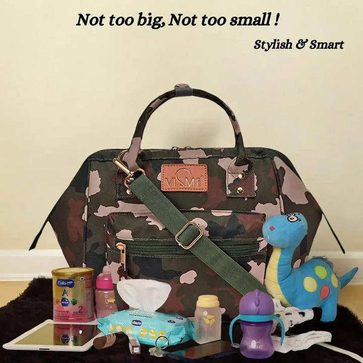 itsy-bitsy-mini-diaper-bag-green-side-look-vismiintrend