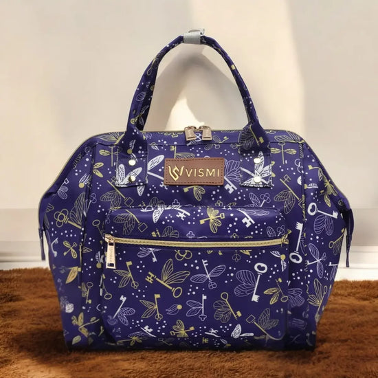 Itsy-Bitsy-Mini-Diaper-Bag-Flying-Keys-Purple